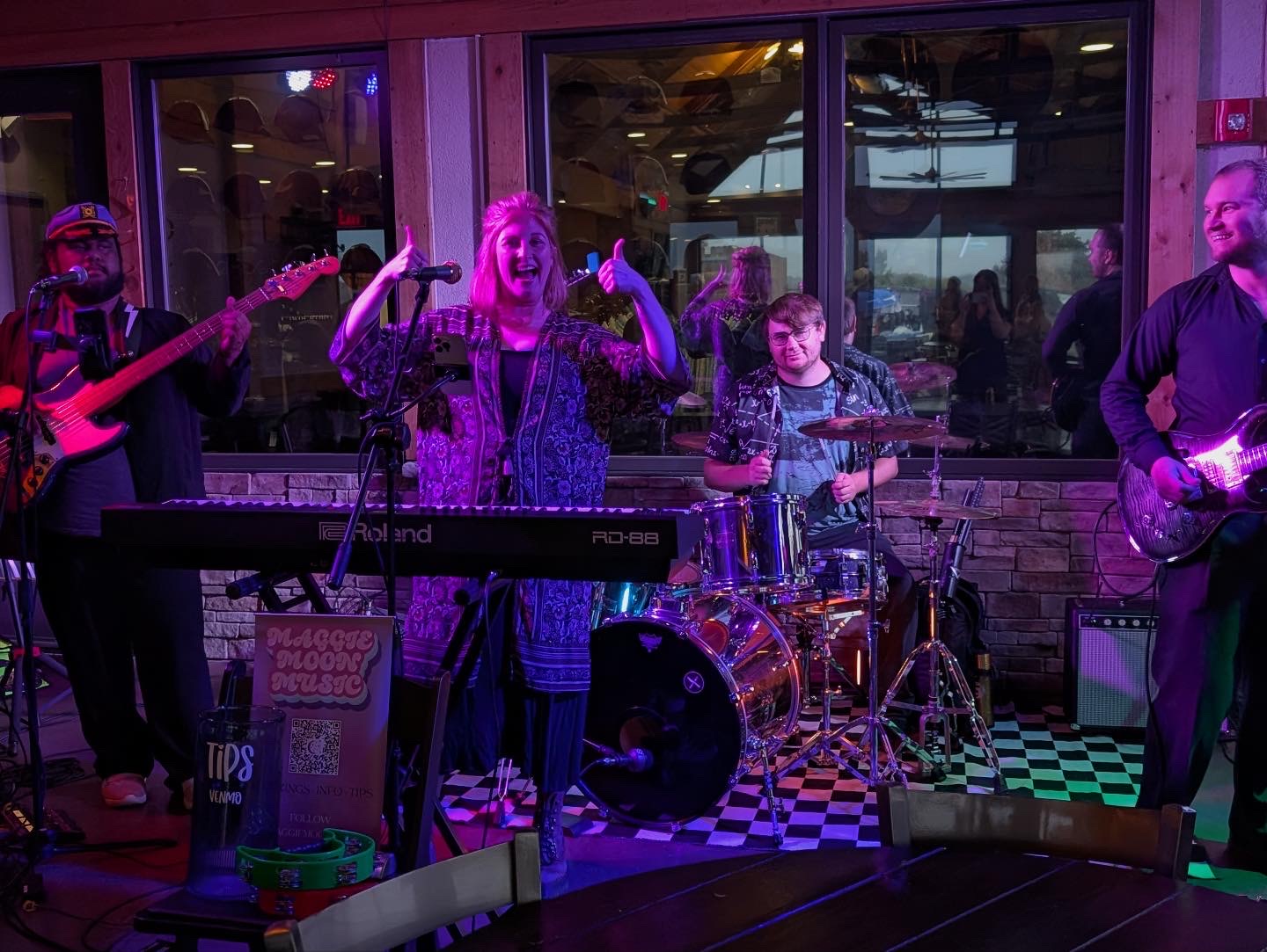Maggie Moon performing with the Wyld Nights Party Band